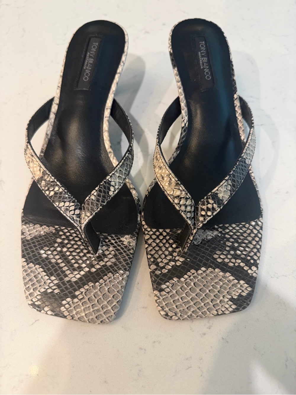 Tony Bianco Snake-Print Thong Sandals in Black and Cream